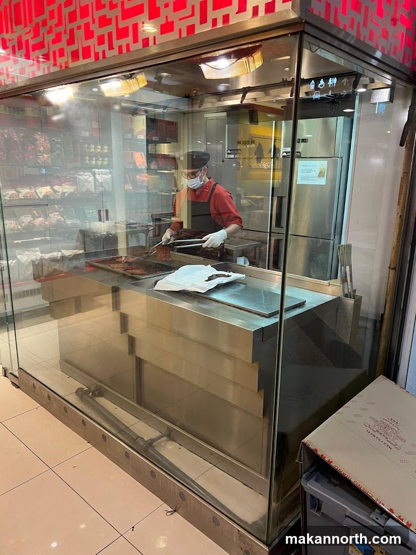 Butcher preparing meat