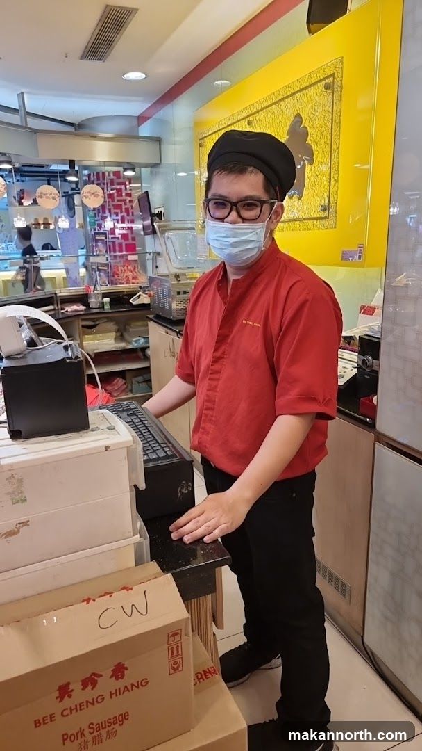 Staff member at a counter