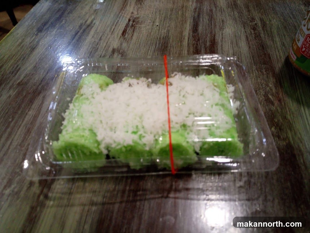 Green dessert with shredded coconut