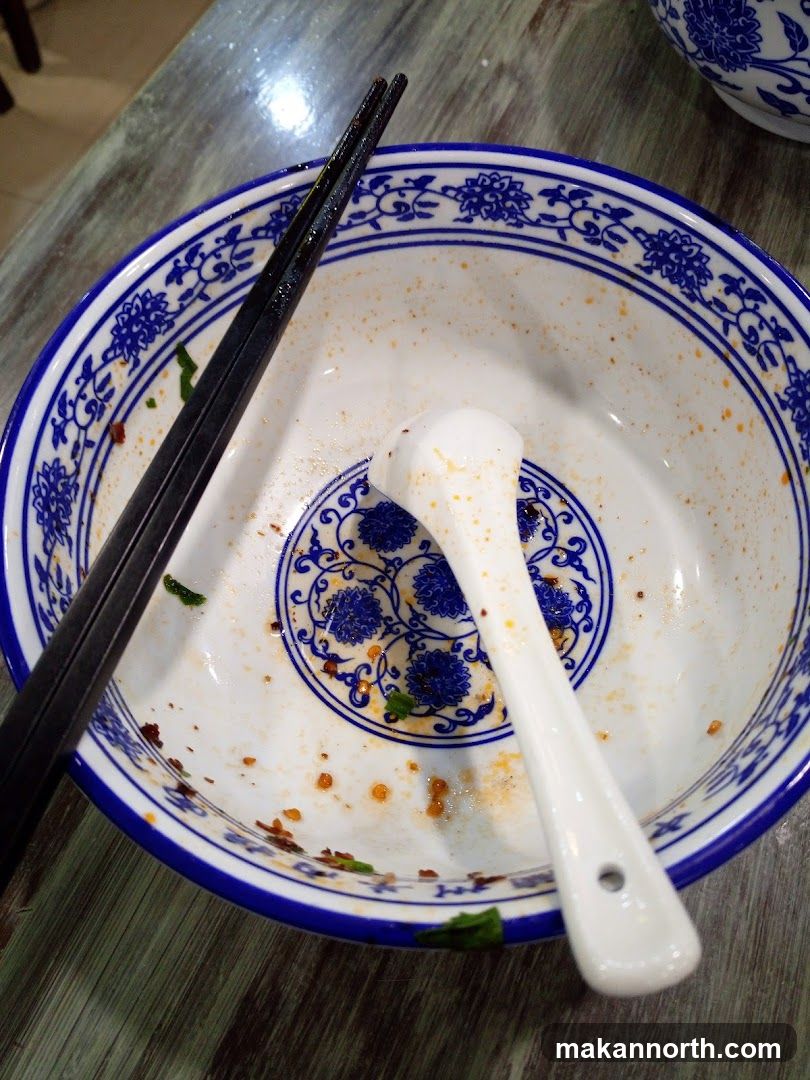 Empty Bowl with Chopsticks and Spoon