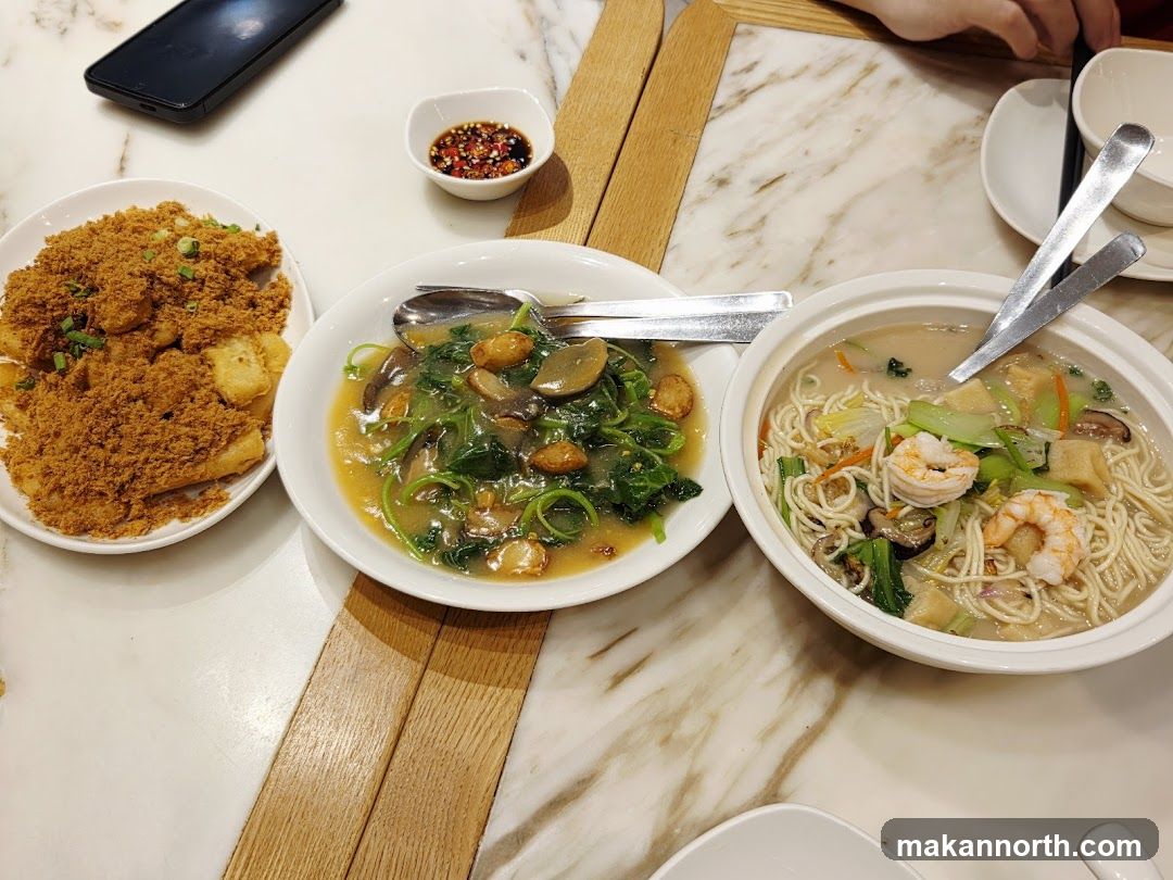 Three Dishes on a Marble Table