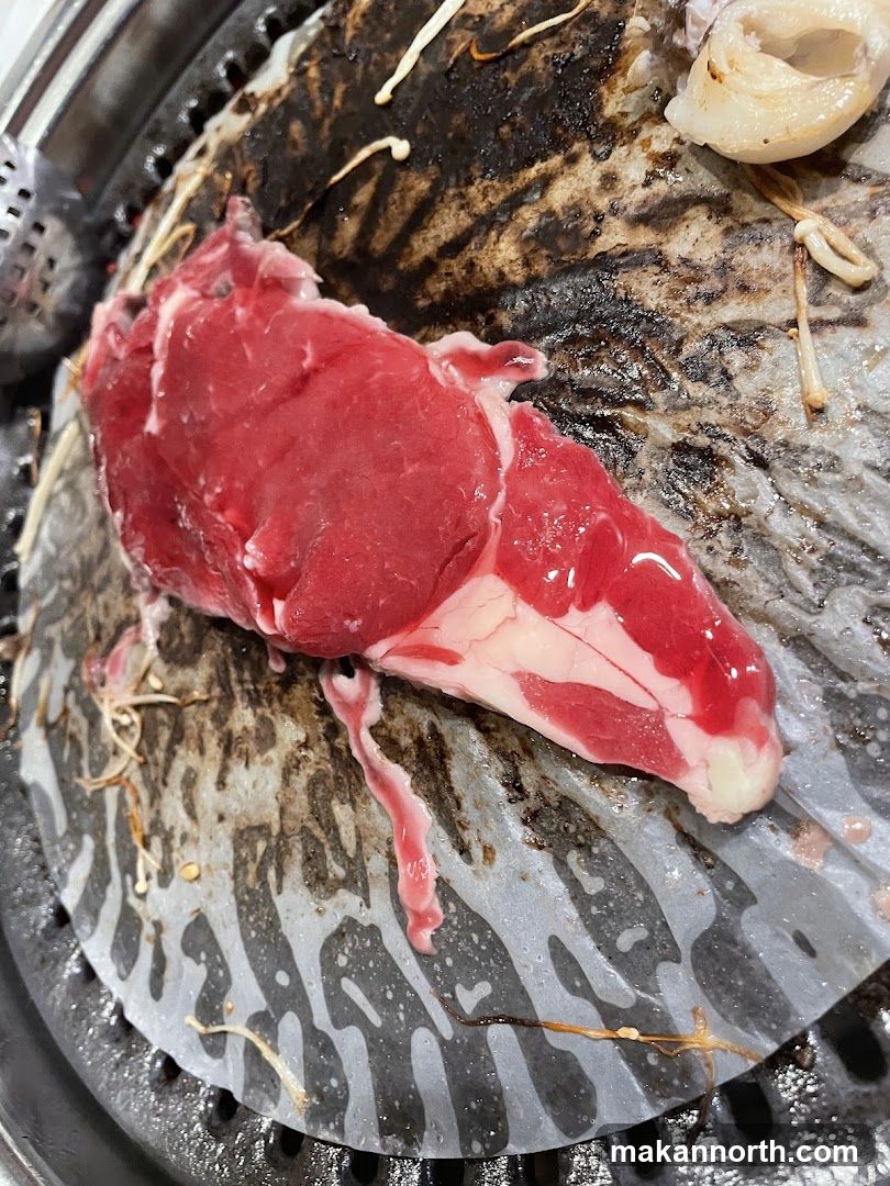 Raw Beef on Grill