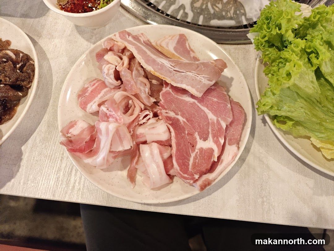 Assorted Raw Meats and Lettuce