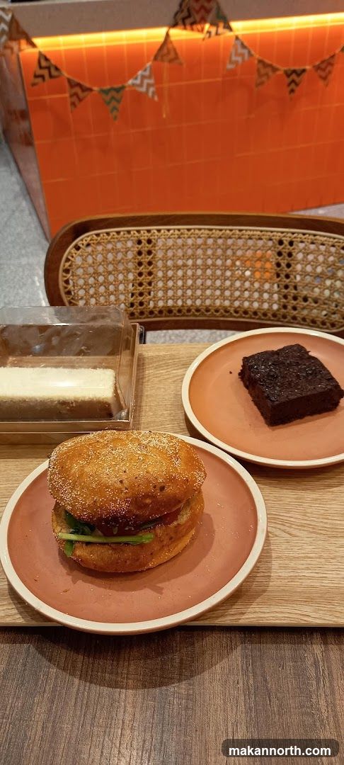 Burger and desserts on a tray