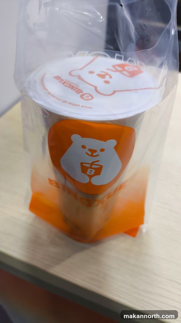 Beverage in branded bag