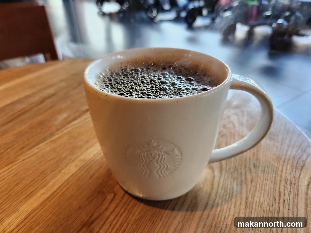 Coffee in a Starbucks mug