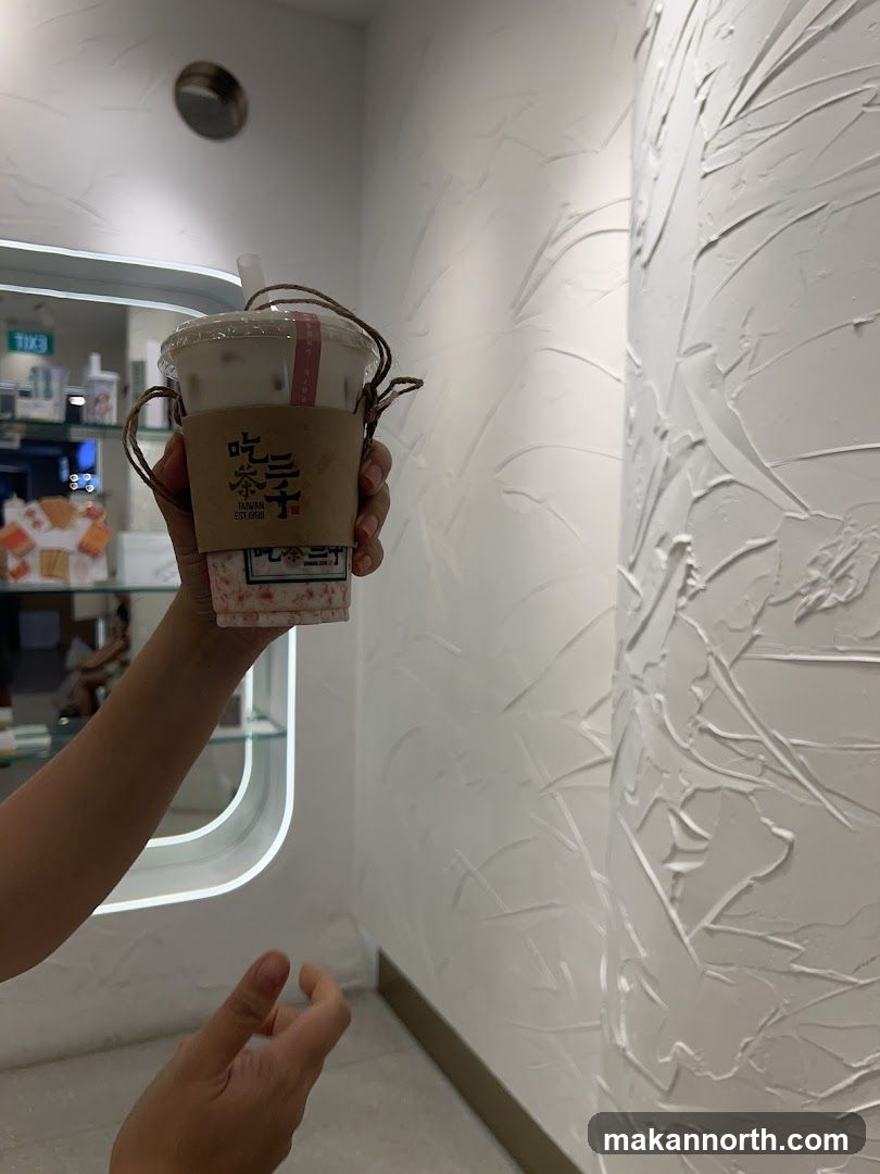 Person holding a drink