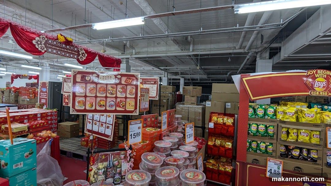 Supermarket aisle with festive decorations