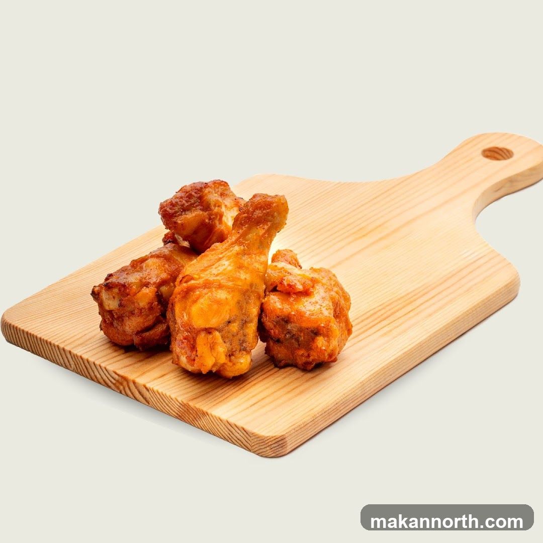 Chicken Drumsticks on Cutting Board