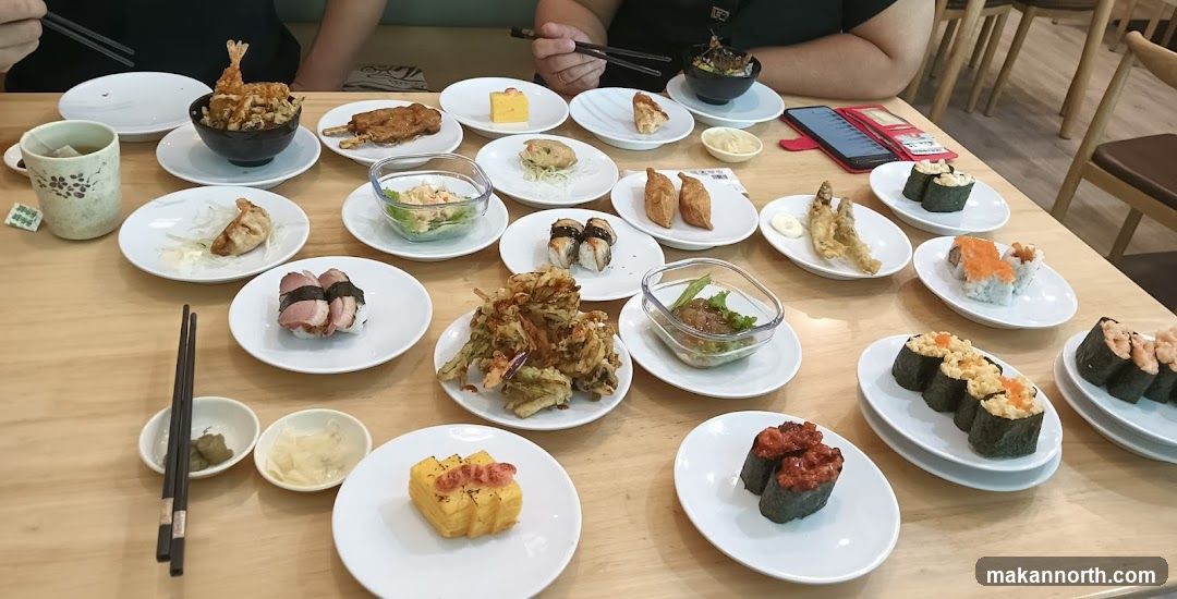 Table full of Japanese food