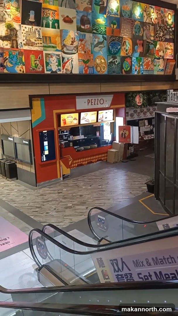 Food stall with artwork above