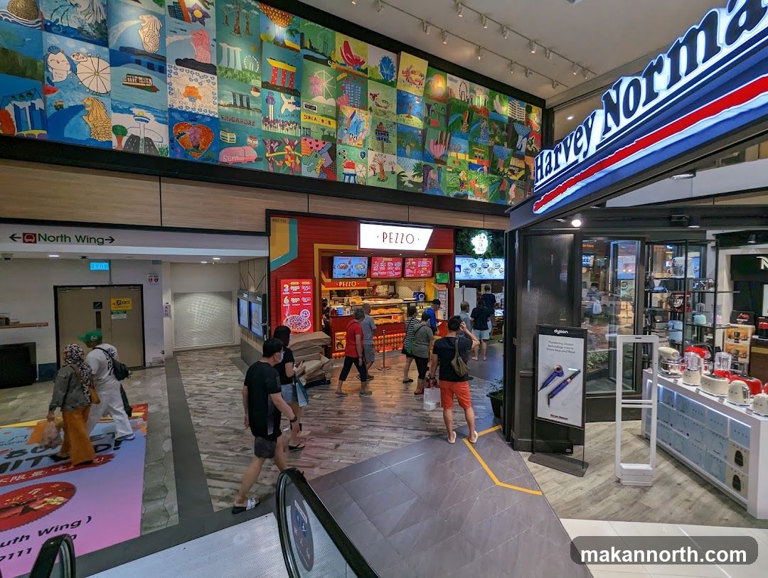 Mall Interior with Shops and Artwork