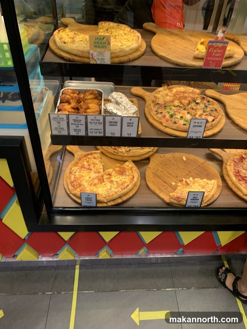 Pizzas and sides on display