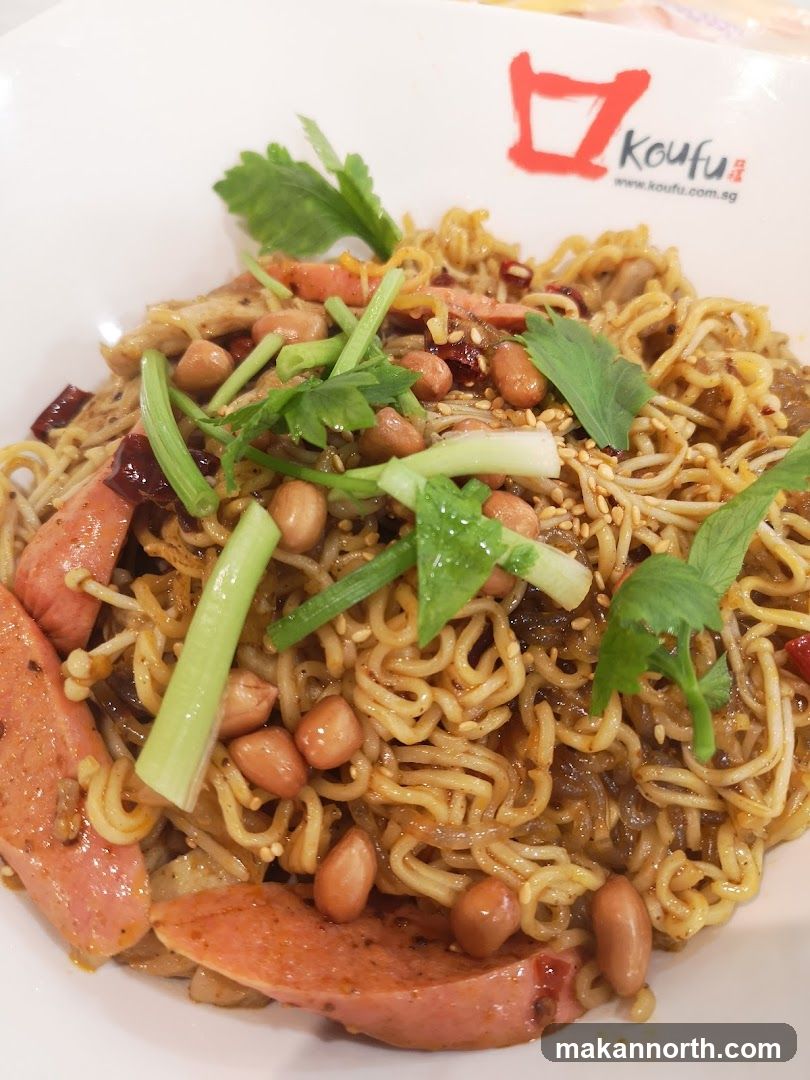 Spicy Noodles with Sausage and Peanuts