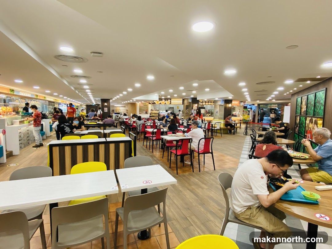 Food court interior with diners