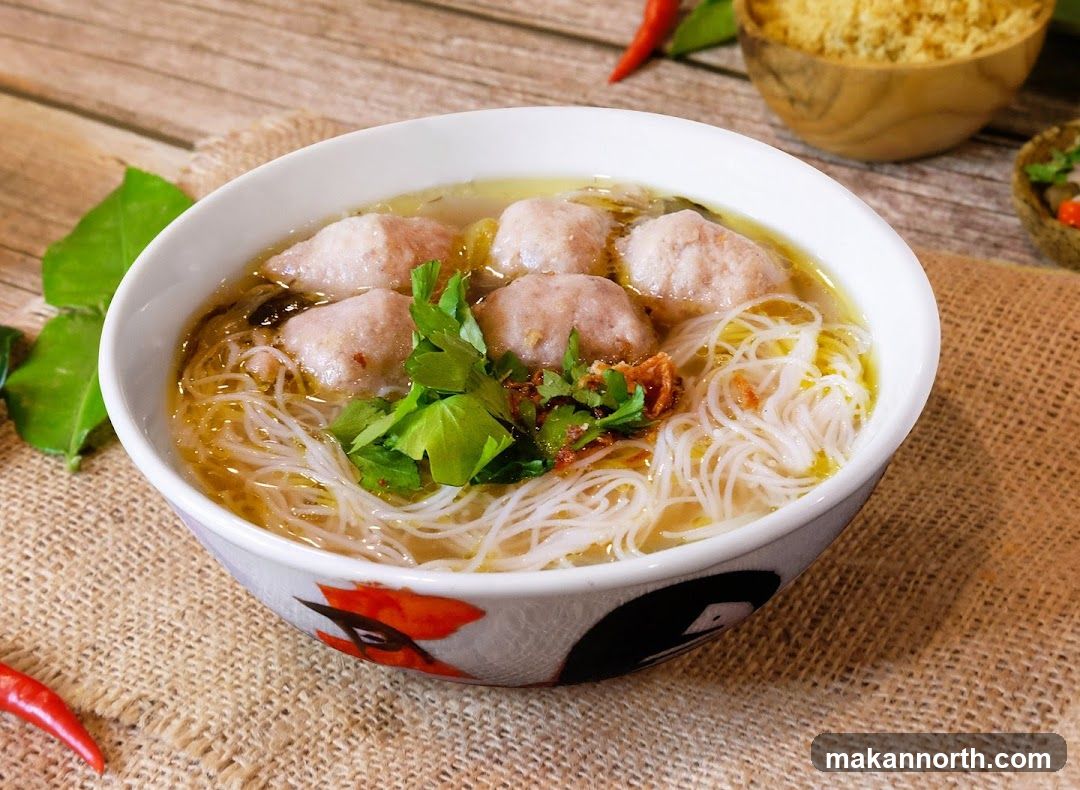 Bowl of Noodle Soup with Meatballs