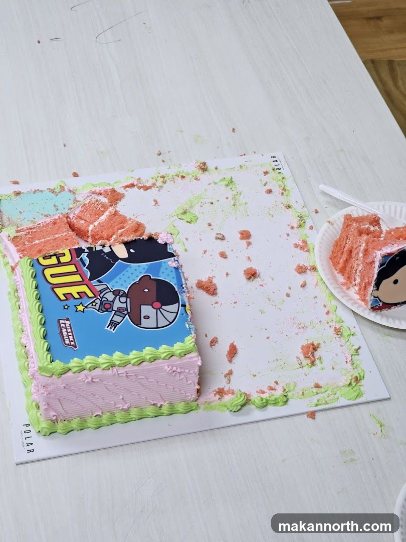 Partially Eaten Justice League Cake