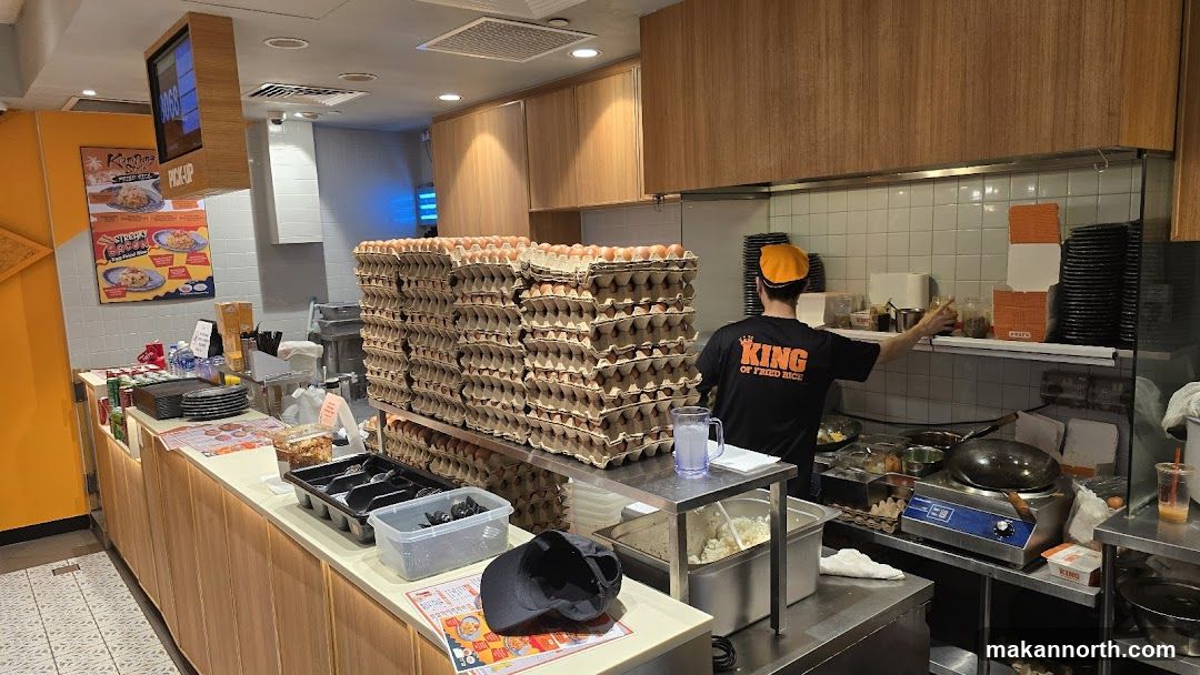 Restaurant Kitchen with Eggs and Staff