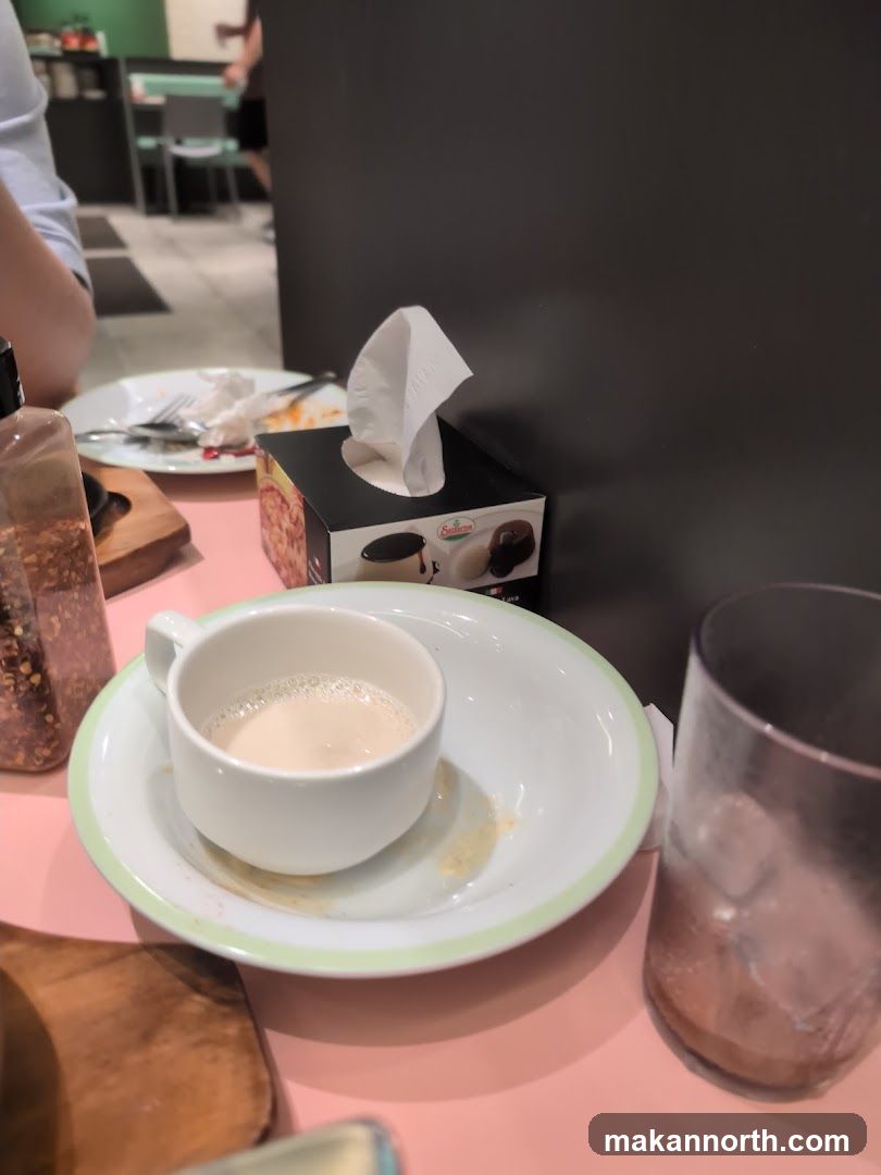 Table Setting with Coffee and Tissue Box