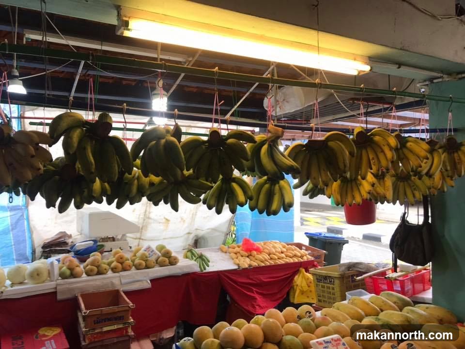 Fruit Stall with Hanging Bananas