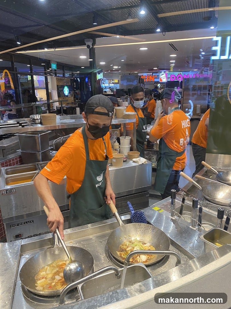 Chefs Cooking in a Restaurant Kitchen